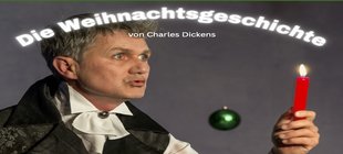 Volker Ranisch im Profil mit Kerze ind er Hand