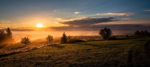 Landschaft bei Sonnenuntergang