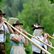 drei Menschen mit Instrument
