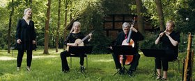 Vier Musiker im Park