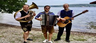 3 Männer mit Instrumenten