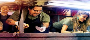 Vier Personen in einem foodtruck