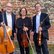 drei Musiker mit Instrumenten
