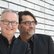 Die beiden Kabarettisten Peter Schaal-Ahlers und Søren Schwesig stehen vor einer gemauerten, weißen Wand. 