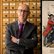 Portrait Prof. Robert Jütte und historische Karikatur über Ärztekrieg