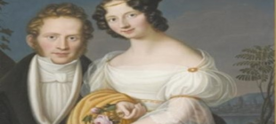 Eine Frau und ein Man als Liebespaar in historischer Kleidung