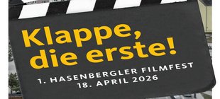 Filmklappe mit Schriftzug Klappe, die erste